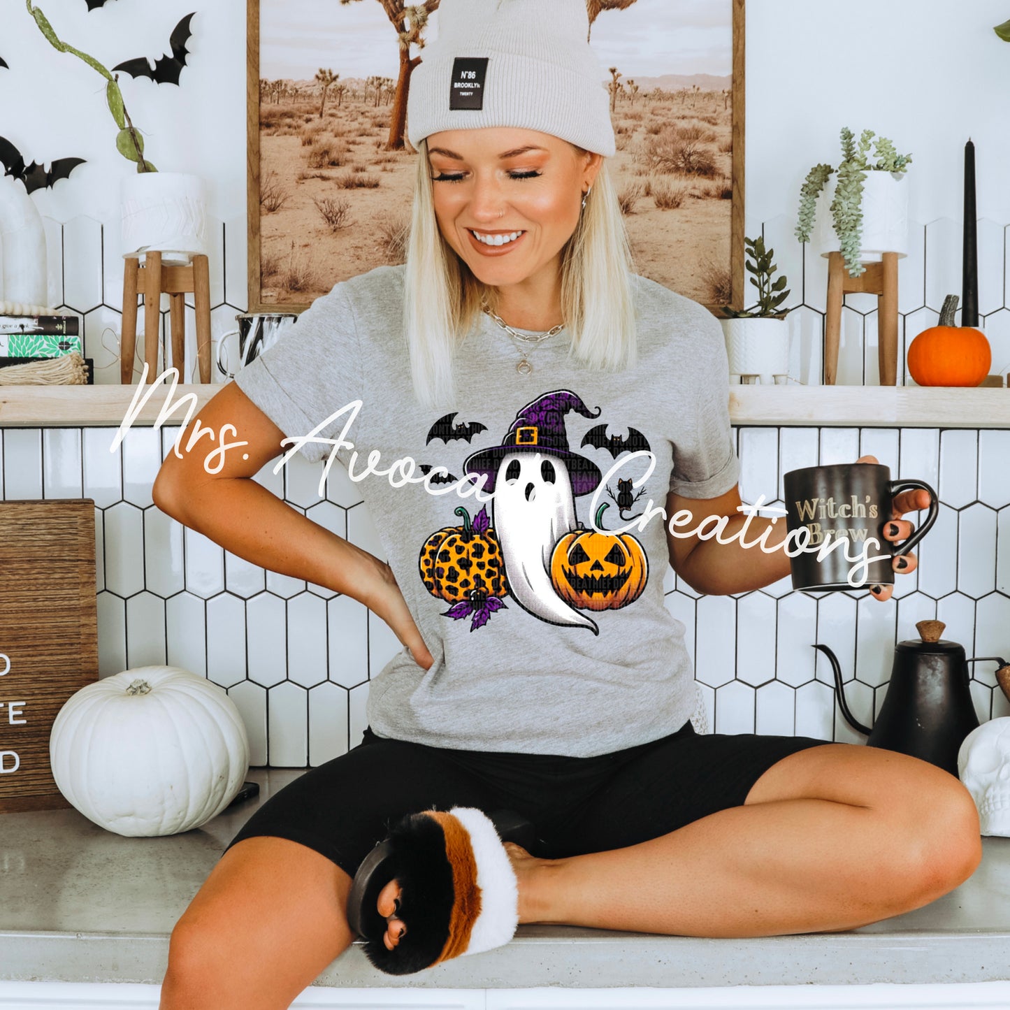 Ghost with witch hat and pumpkin