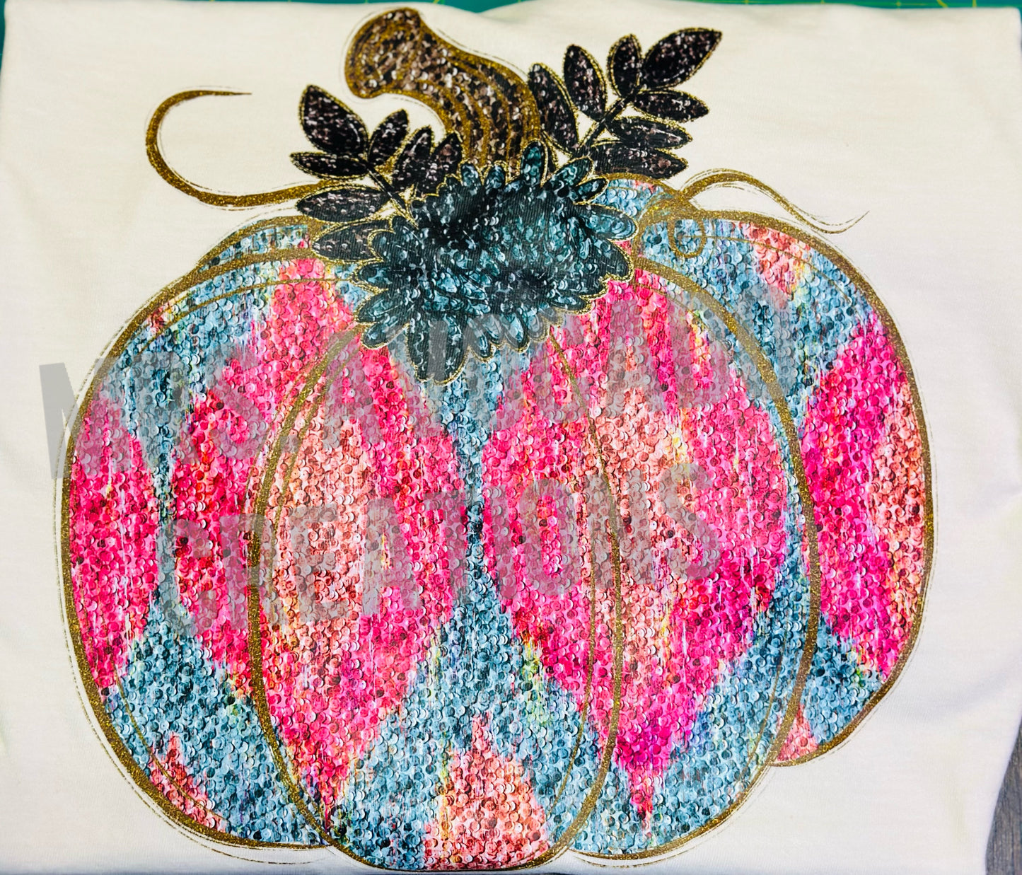 Pink and teal pumpkin
